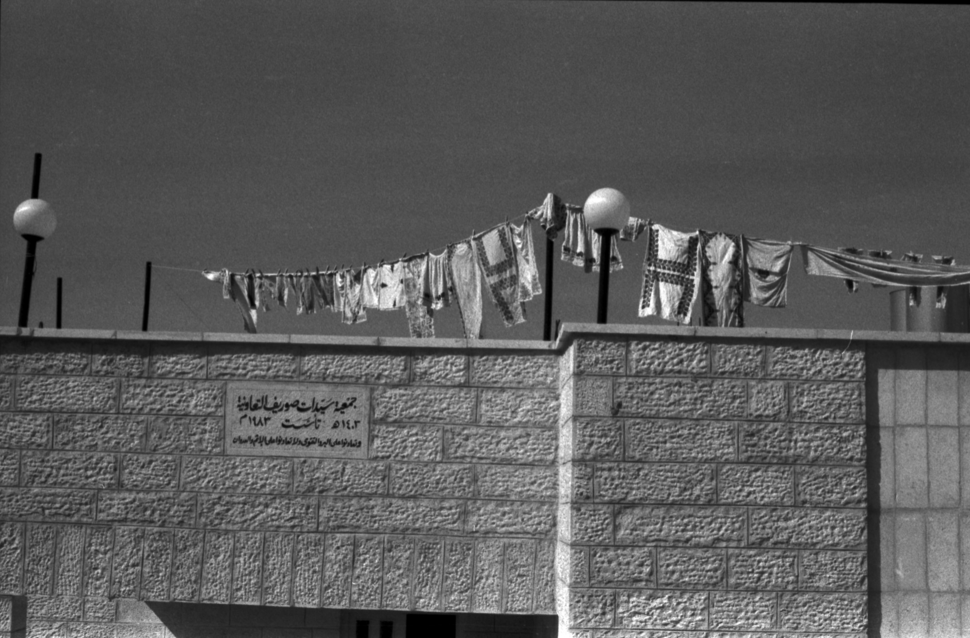A black and white photo of a wall in Palestine