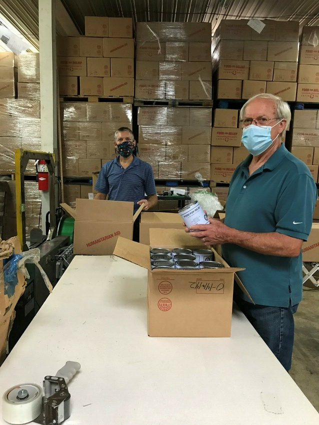 Brian Snader, packing coordinator, and volunteer Will Conrad (Lititz, Pennsylvania) check cans of meat at the MCC East Coast Material Resources Center in Ephrata, Pennsylvania.

All local COVID-19 p