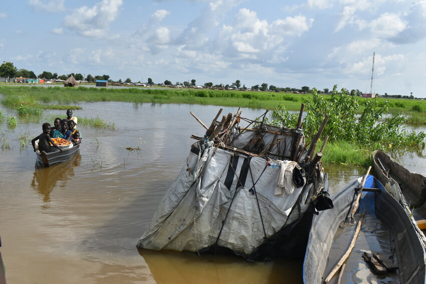People in Rubkona informal settlement camp were devastated by flooding in their homes. Some are shown using a boat to navigate the flood water.

MCC staff and SSUDRA staff conducted a rapid needs as