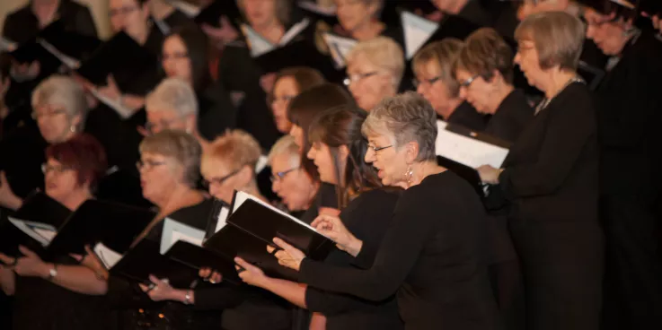 A choir singing hymns