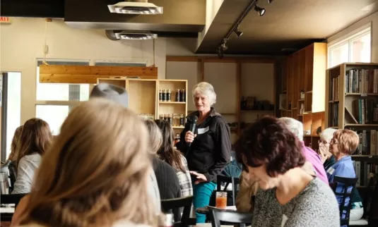 Woman talking to group