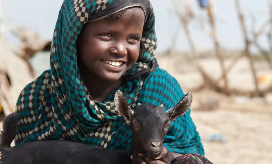 A child with her goat