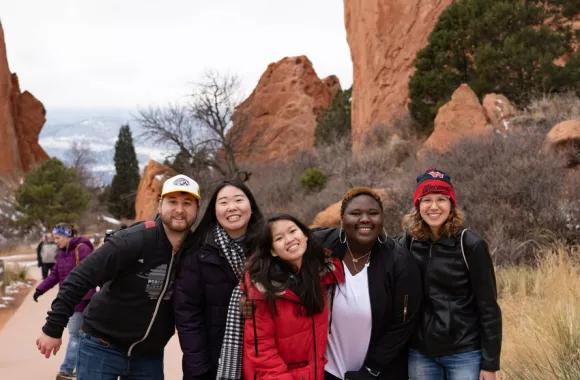 From left, Justin Weaver, Jewel Chung, Risa Bohn, Linda Moyo and Magdalena Wenger, participants of the Young Adult Peacebuilders Training, build relationships as they visit the Garden of the Gods in C