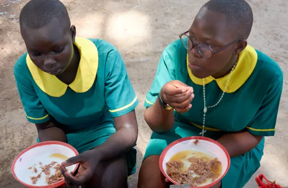 Two boys eating